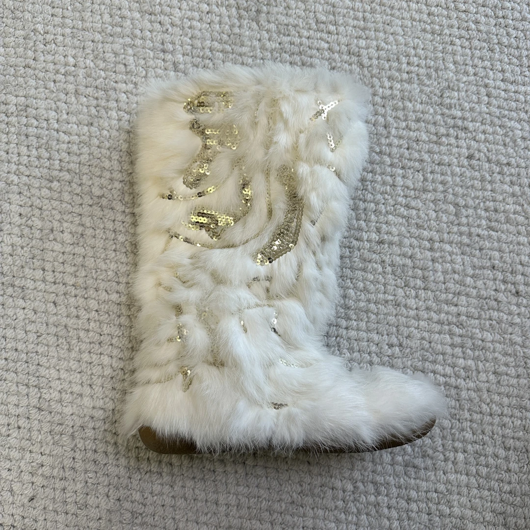 「Xuan」绒绒长靴。