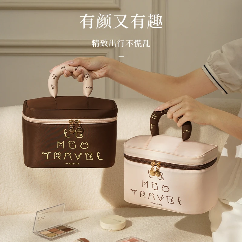 化妆包女2025新款高端便携式出差旅行洗漱护肤品收纳包精致可爱