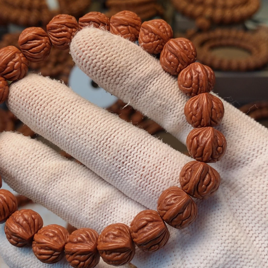 老***王桃核手串秦岭龙纹