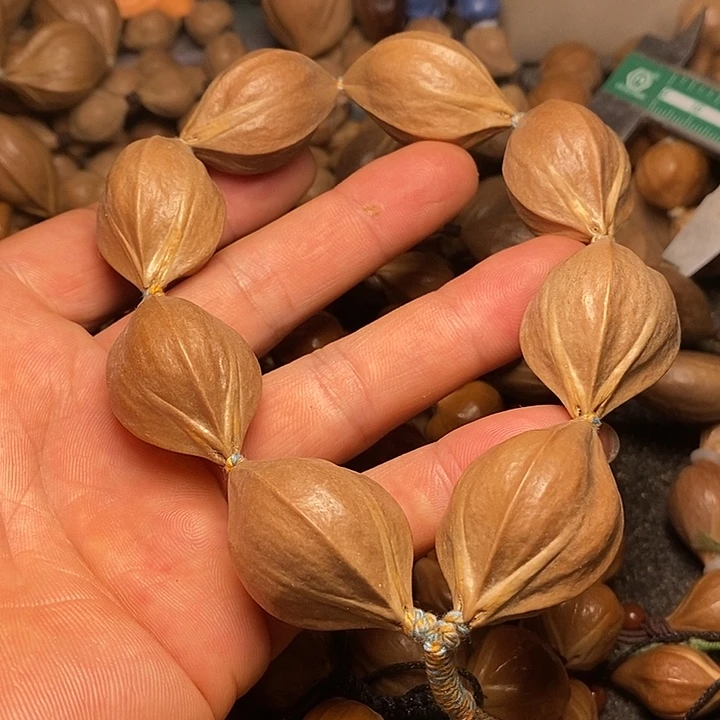 橄榄核手串圆四花手持7
