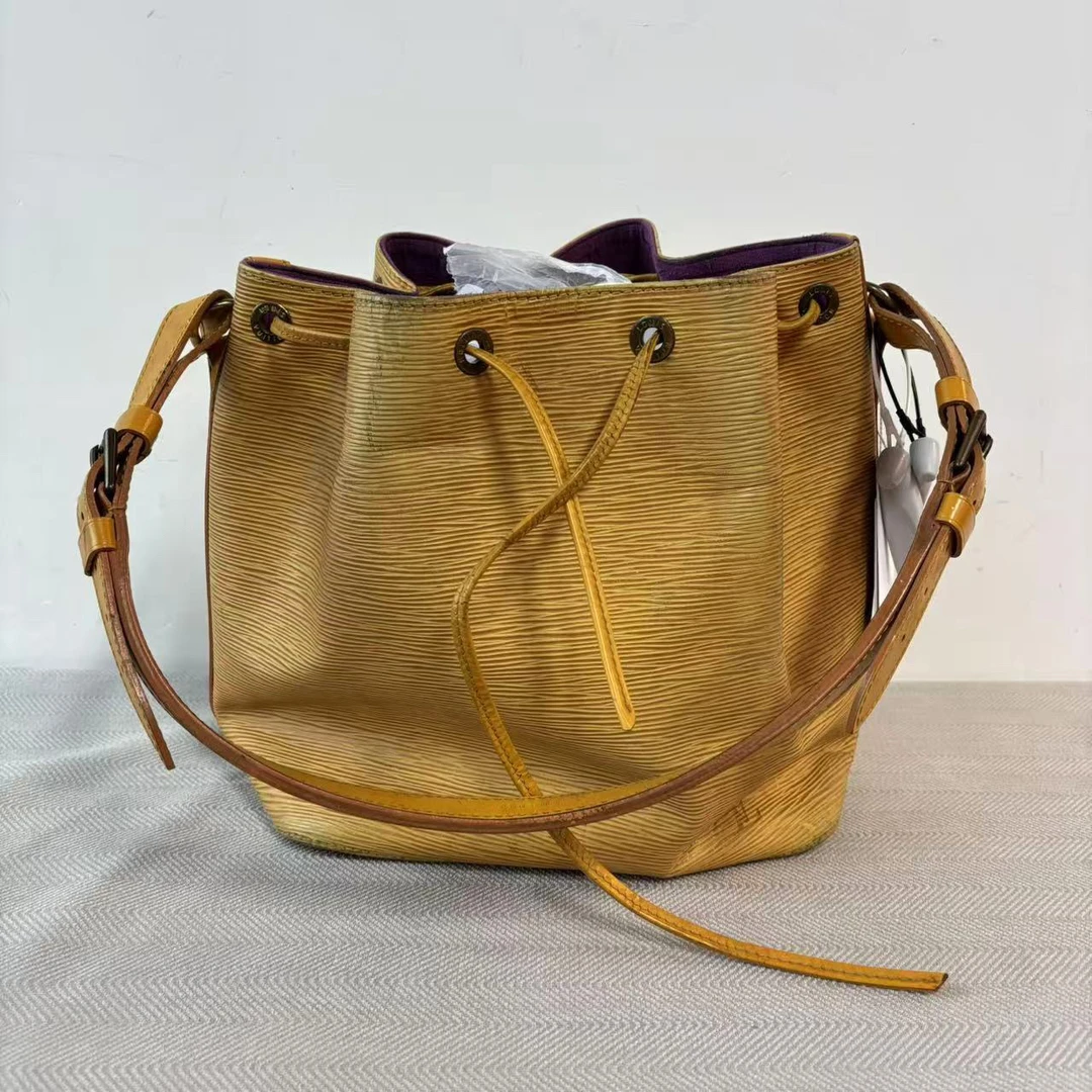 95新 LouisVuitton/路易威登 06-42黄色牛皮系列女士单肩水桶包