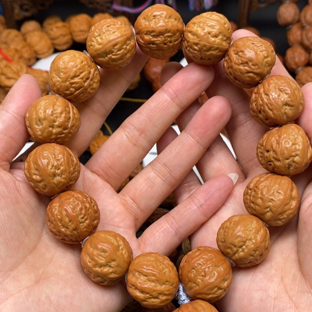 桃核手串肉筋元宝