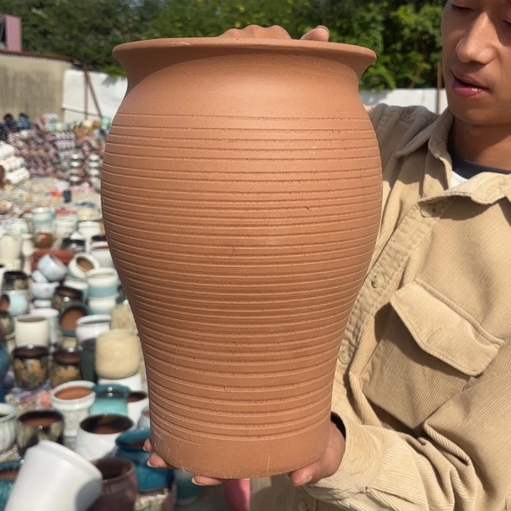 红陶鱼尾一个口径20高度31