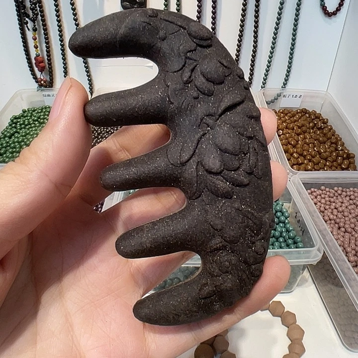 泥塑乌发方莲花梳子一把