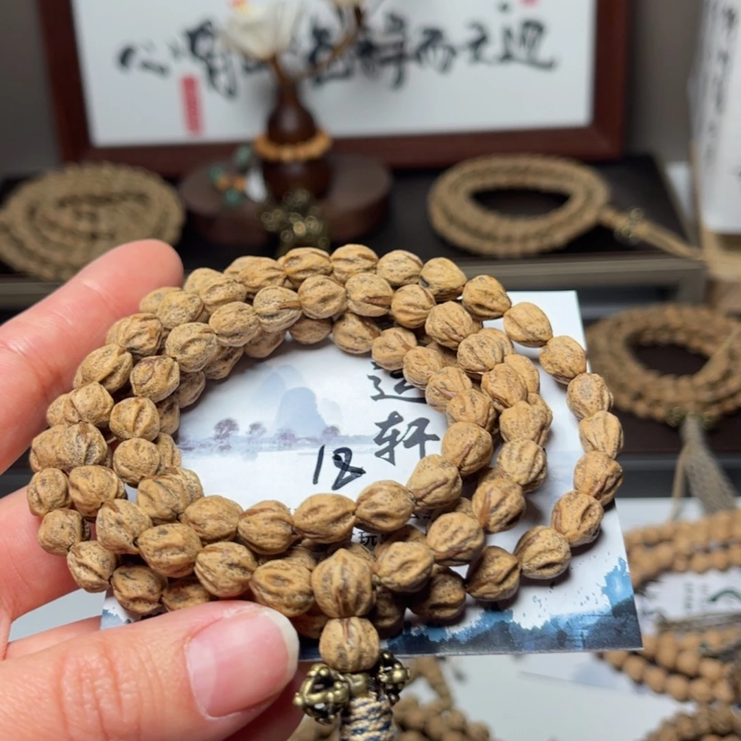 倪***光柏香籽/百香籽吊坠