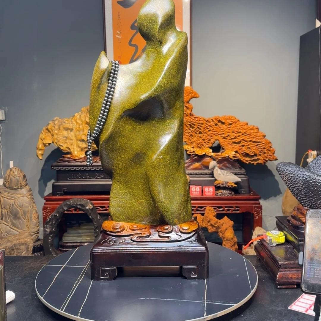 包***包藏玉释迦摩尼奇石