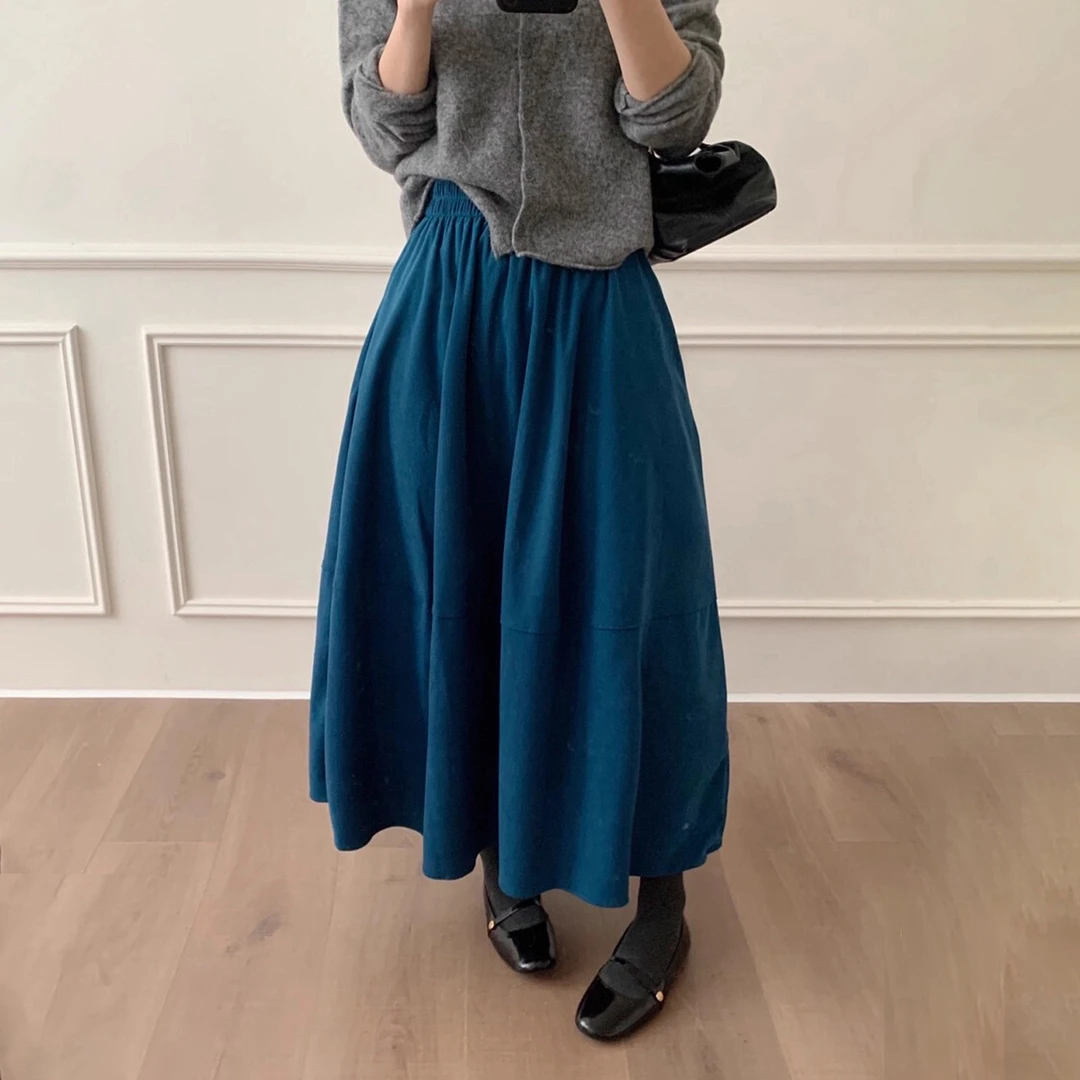 灯芯绒弯刀A字半身裙秋冬新款遮胯显瘦松紧腰显白长裙爆款裙子