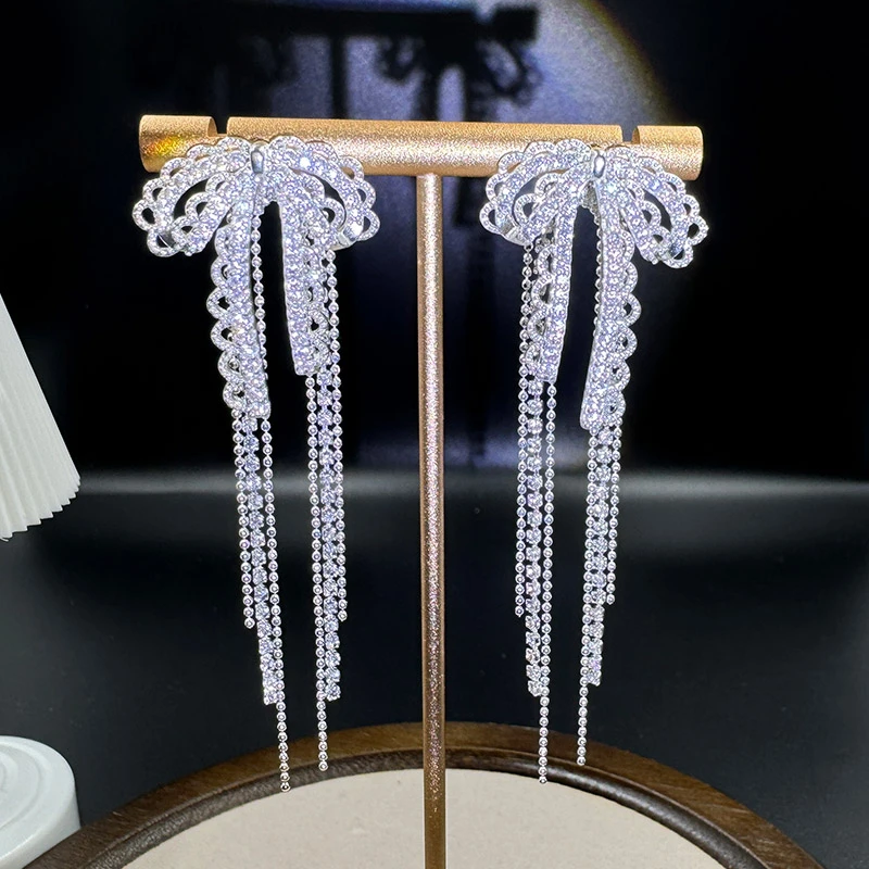 铜合金耳饰 小众设计感满钻蝴蝶结流苏两戴耳环女ins百搭高级耳钉