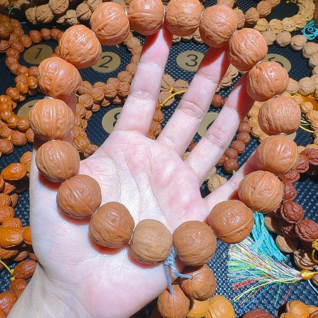 文玩核桃吊坠光头元宝手持