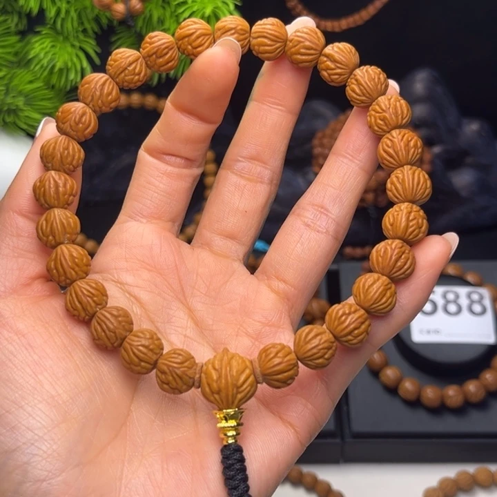 小***猛桃核吊坠小金豆11