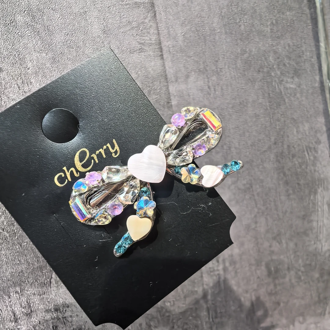 E899蓝紫色蝴蝶结闪闪爱心边夹