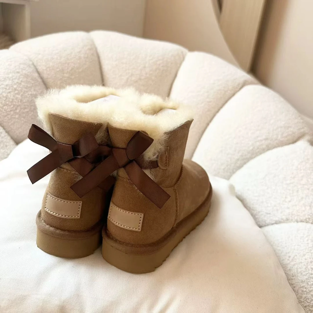蝴蝶结薄低皮羊毛一体雪地靴时尚百搭保暖冬季皮毛一体短筒