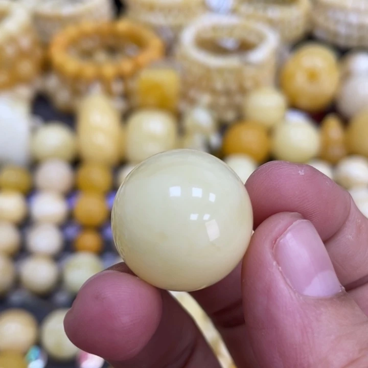 蜜蜡未镶嵌裸石21.6mm瑕疵打孔