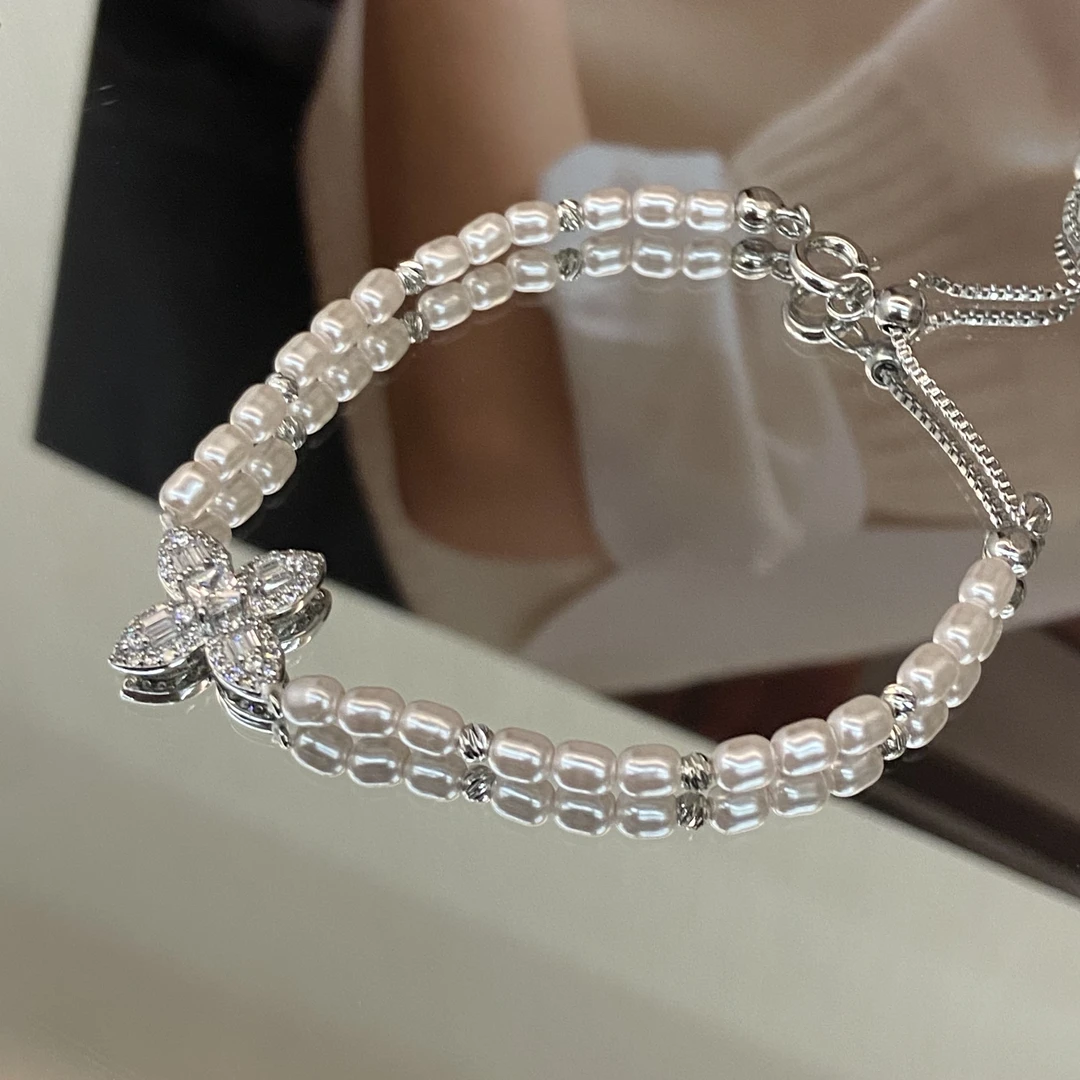 铜合金仿珍珠手链 镀K金 曼塔玫瑰蝴蝶结 韩系气质手链S909