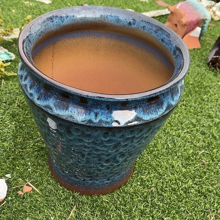 紫砂花盆口25高29。。。。。。。。。。