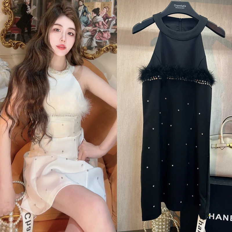 【紫黛奢旅】62456铆钉水钻羽毛镶边挂脖连衣裙