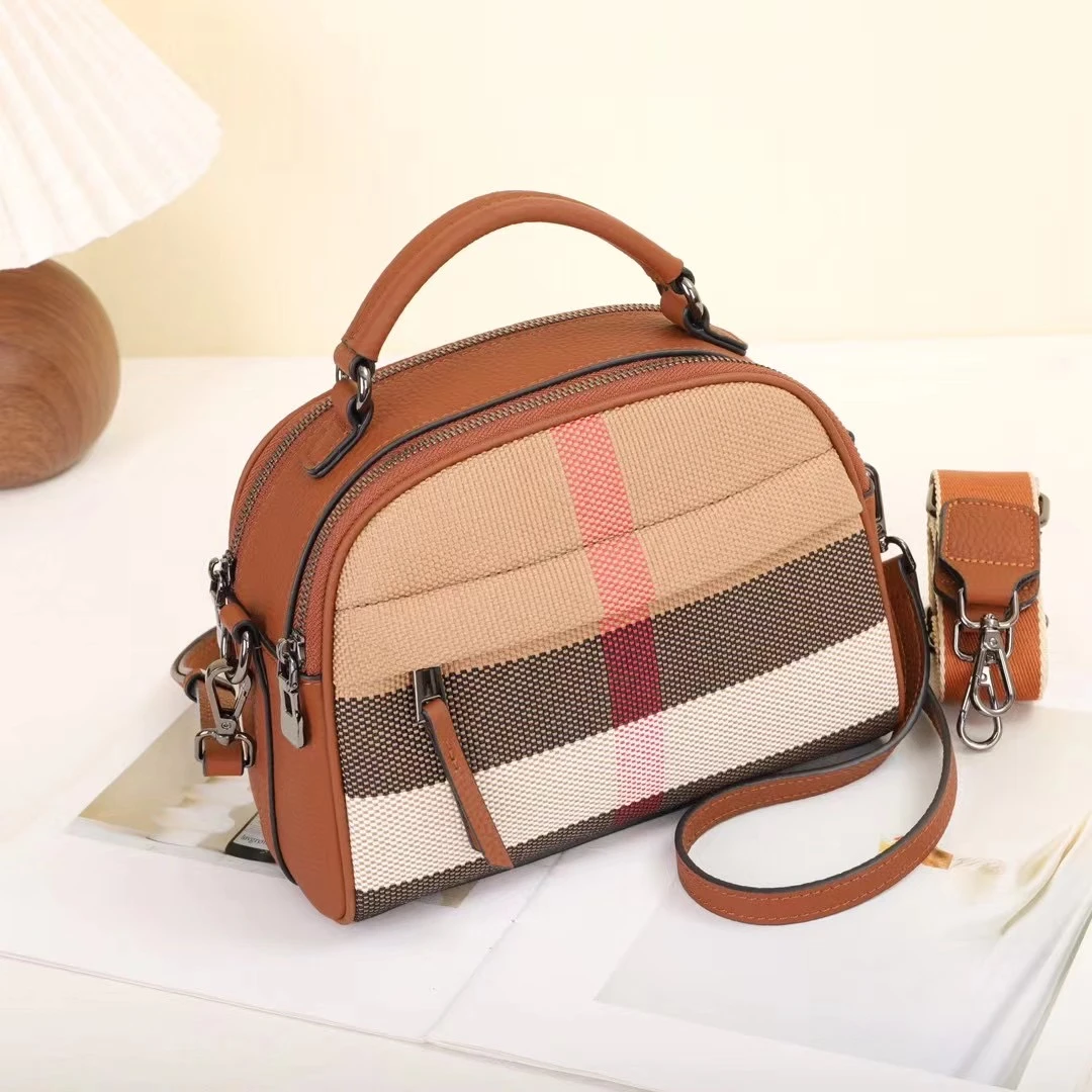 多工能手提单了斜挎格子包配头头牛皮