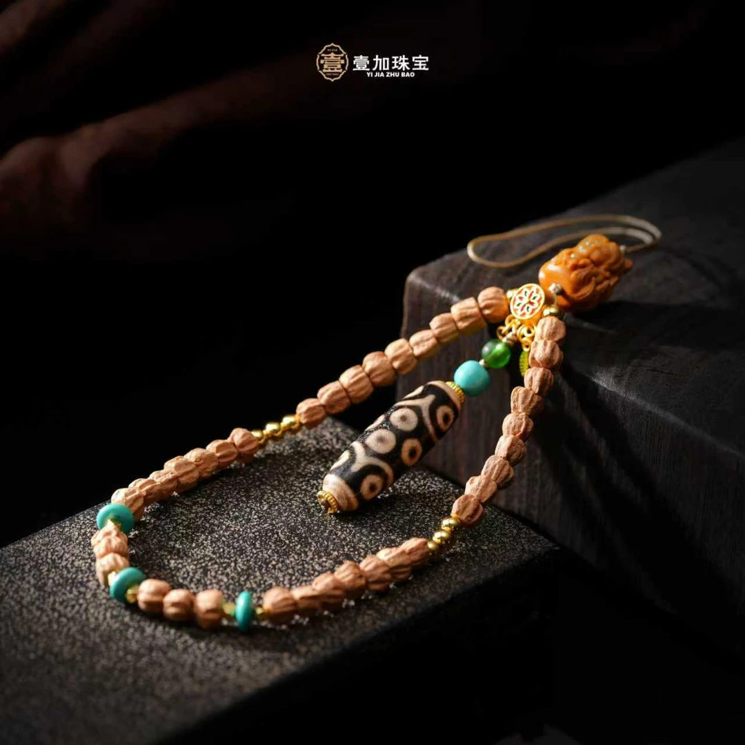 壹加林妹妹 |  玛瑙十五眼檀木九W挂件多样性发其一
