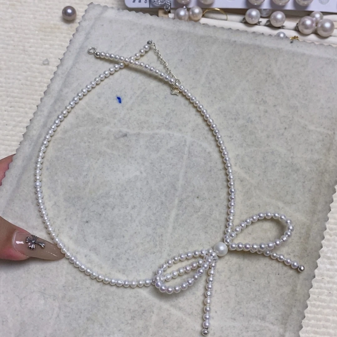 花岗石铁合金锡合金铁合金白珍珠蝴蝶结项链
