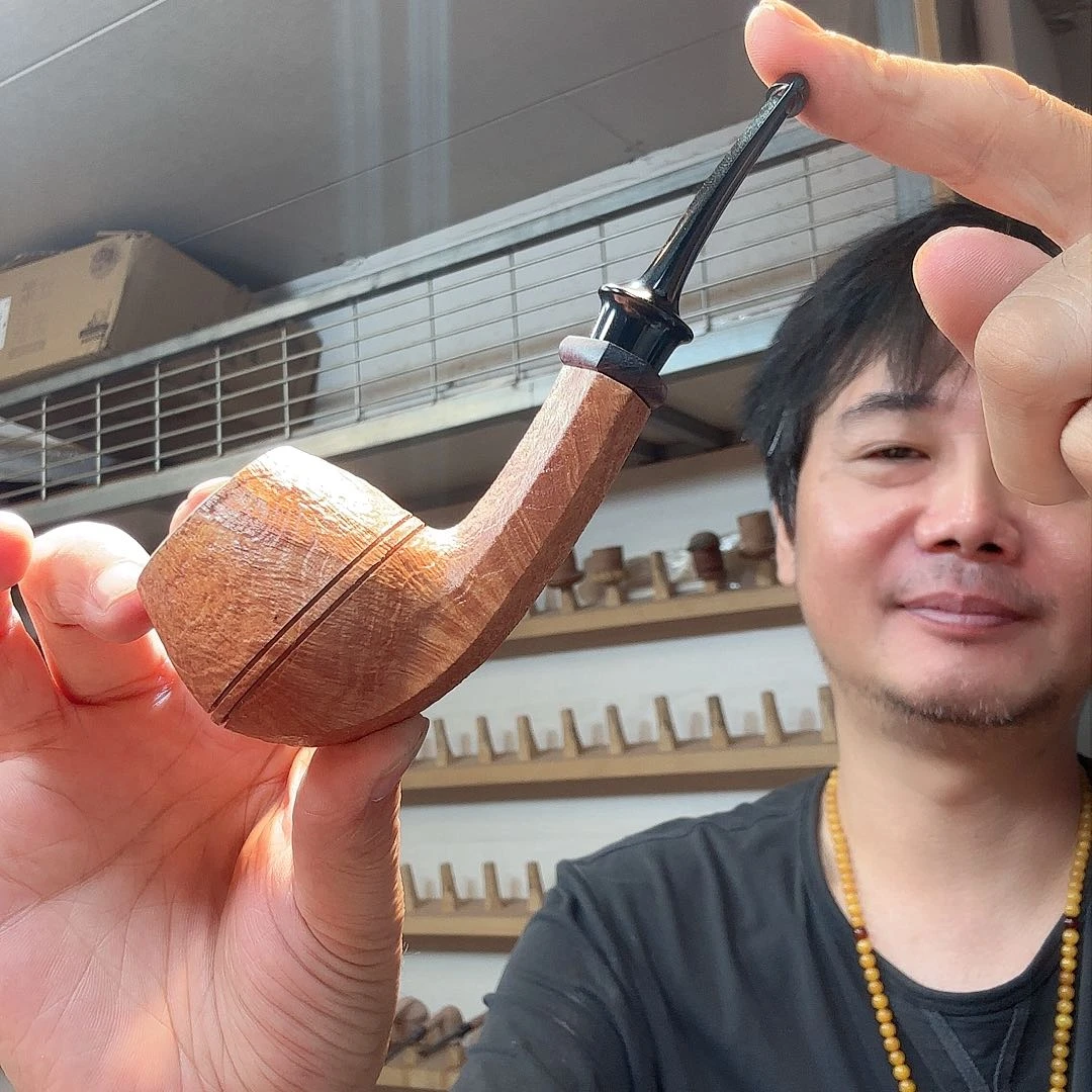 隔****叔焦耀烟斗一牛头