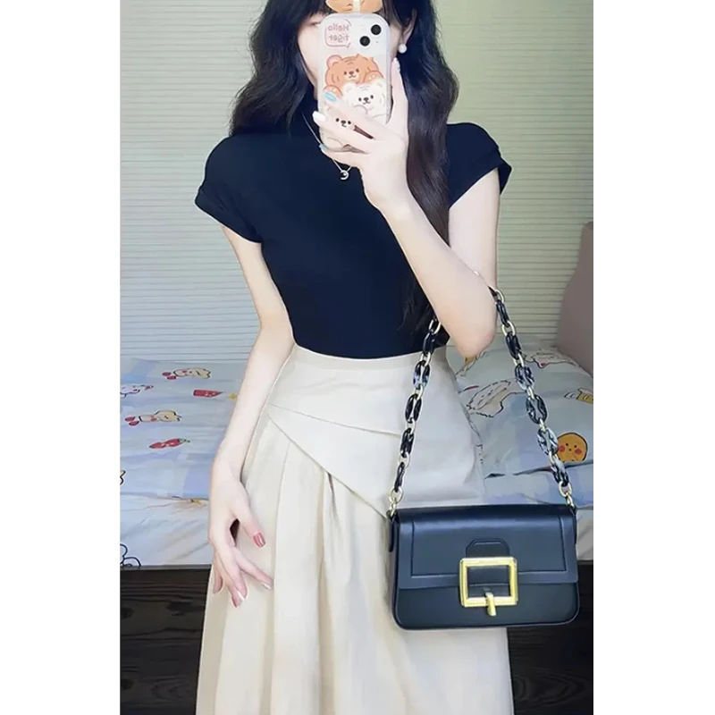 富家财阀千金气质衣服2025新款洋气黑色T恤上衣杏色半身裙套装