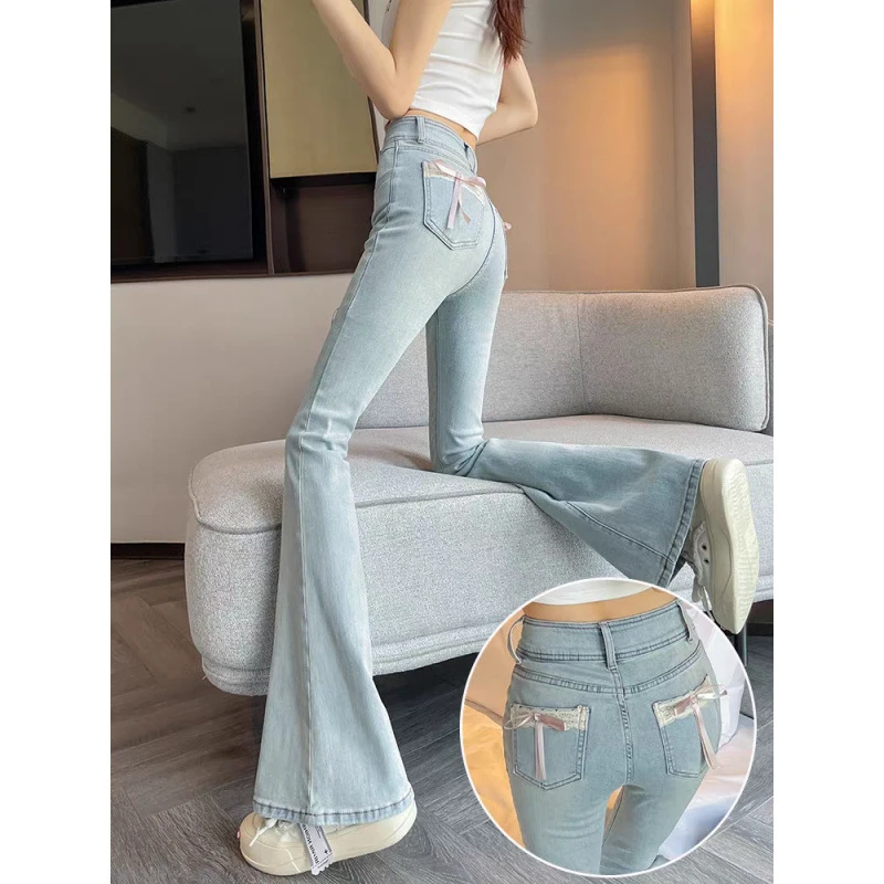 浅色蜜桃臀微喇牛仔裤春夏2025新款高腰百搭小个子蝴蝶结马蹄裤