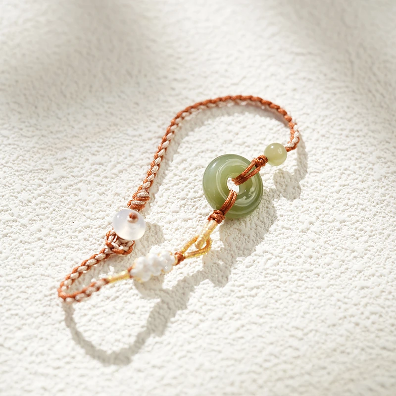 【鑫浩矿业】新疆和田玉-平安扣深色手牌一件