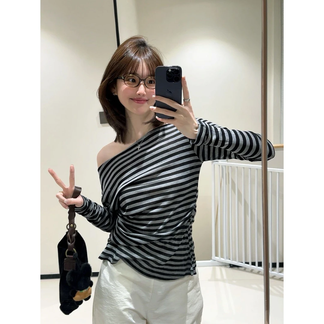 韩式斜肩条纹纯欲长袖t恤女2025春秋设计感小众修身显瘦打底上衣