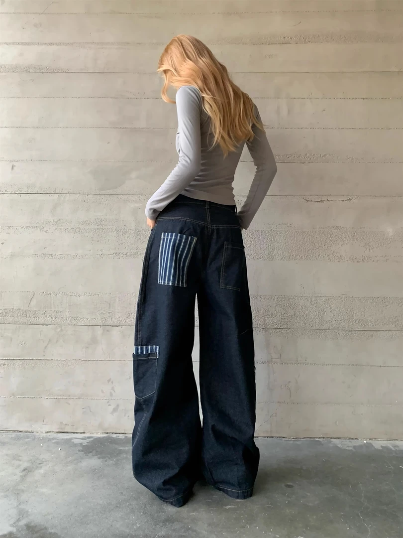 美式复古水洗做旧弯刀裤大口袋设计感牛仔裤女显瘦长裤竖杠图案