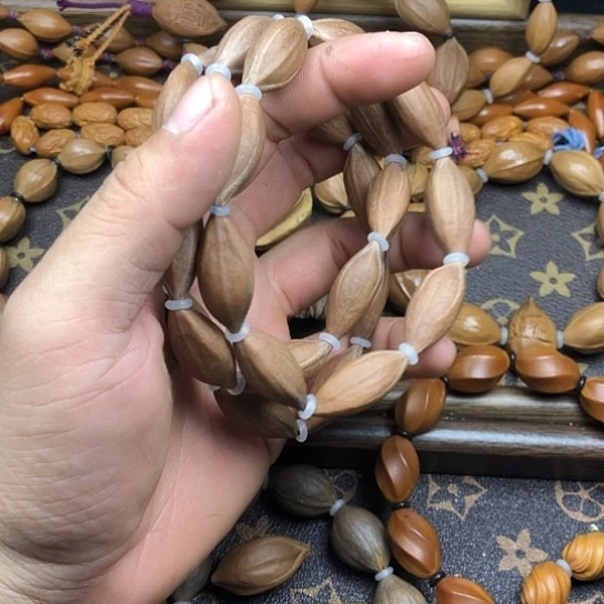 橄榄核吊坠直心柳叶三面佛