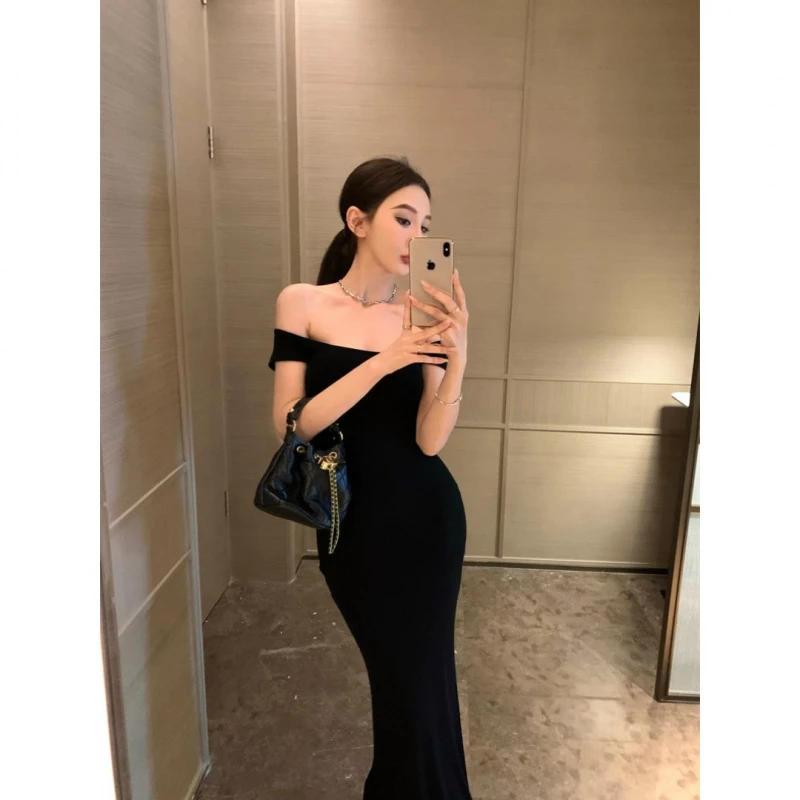 一字肩收腰连衣裙女夏季气质黑色修身鱼尾长裙显身材紧身包臀裙子