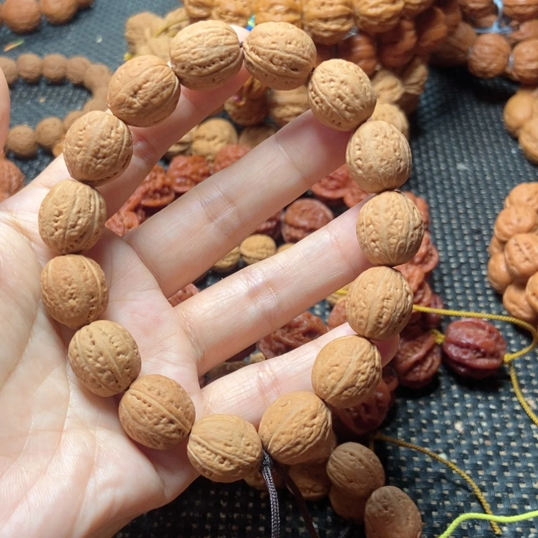 文玩核桃吊坠小光头手串