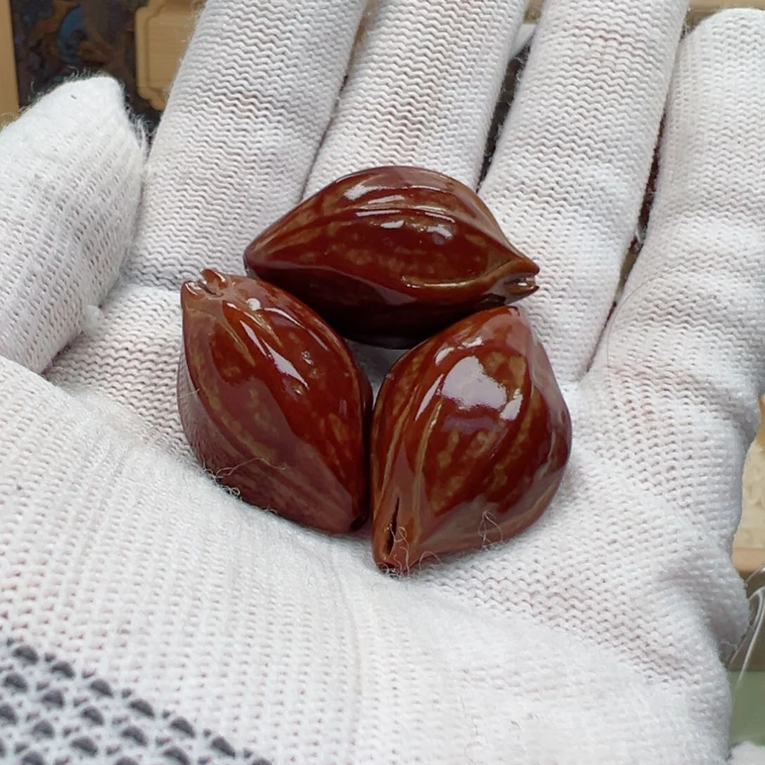 【闪购商品】橄榄核吊坠山*行9544568998766788