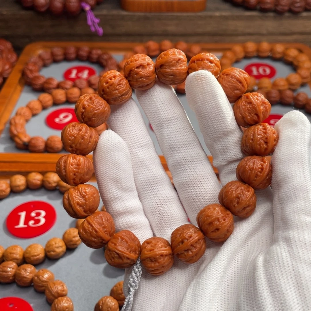 哦***~文玩核桃手串金玉满堂