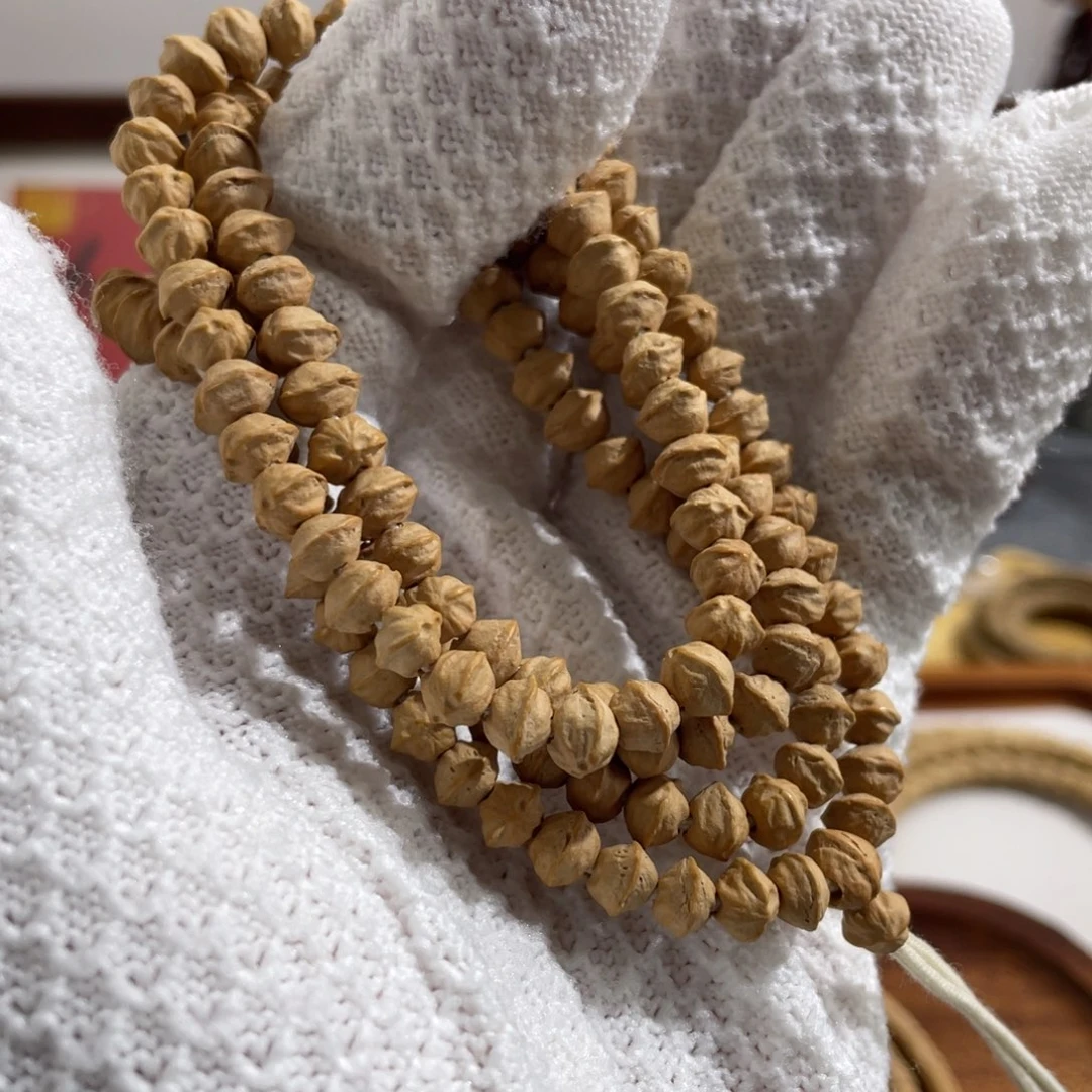 柏香籽/百香籽吊坠白芽粉皮玉化横打6mm