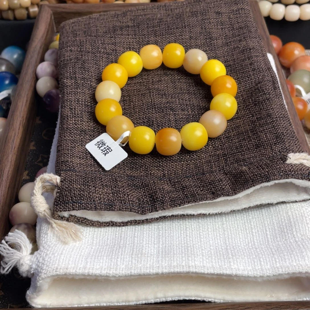 枫***丹吊坠菩提根/象牙果1.6，微瑕