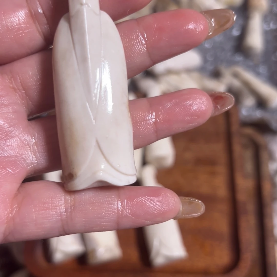 鹿骨把件尼***克手把件