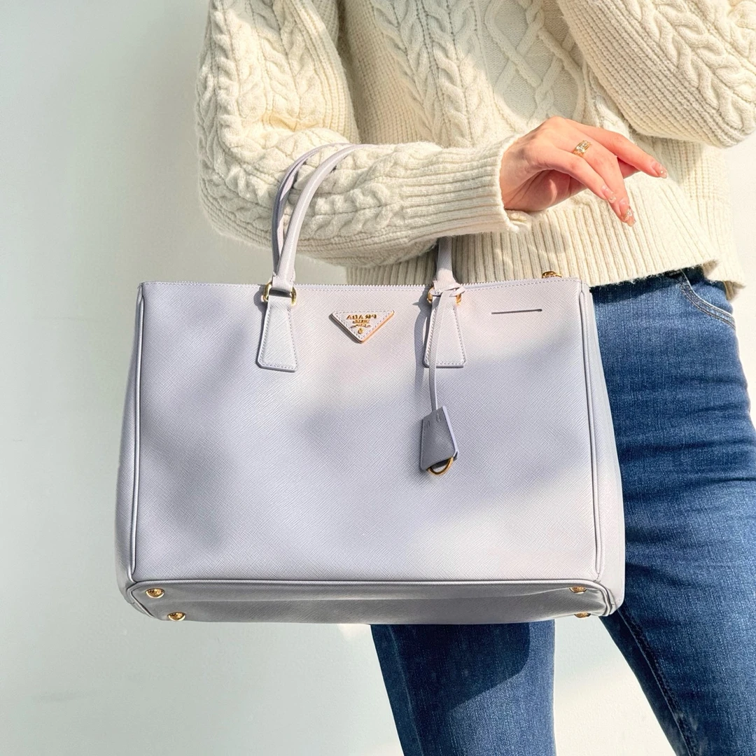 95新 Prada/普拉达 prada紫色金杀手手提包