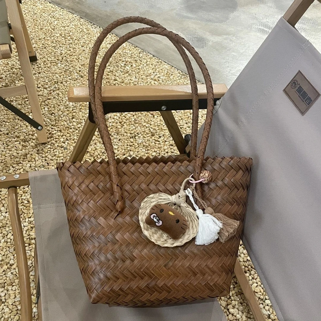 新疆包邮沙滩度假风草编手提包休息文艺腋下包小众ins礼手工单肩