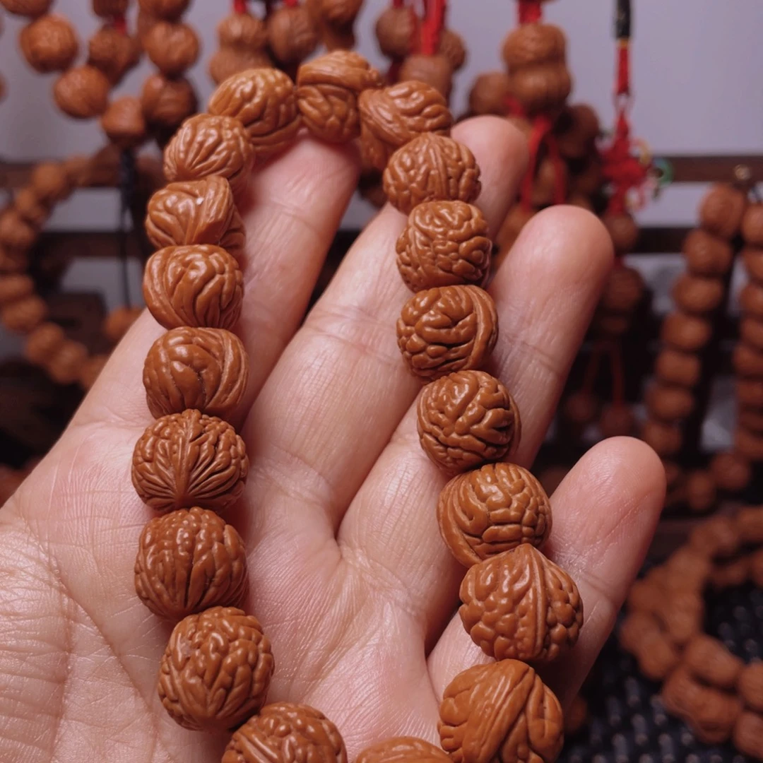 木质类龙纹桃枭手串