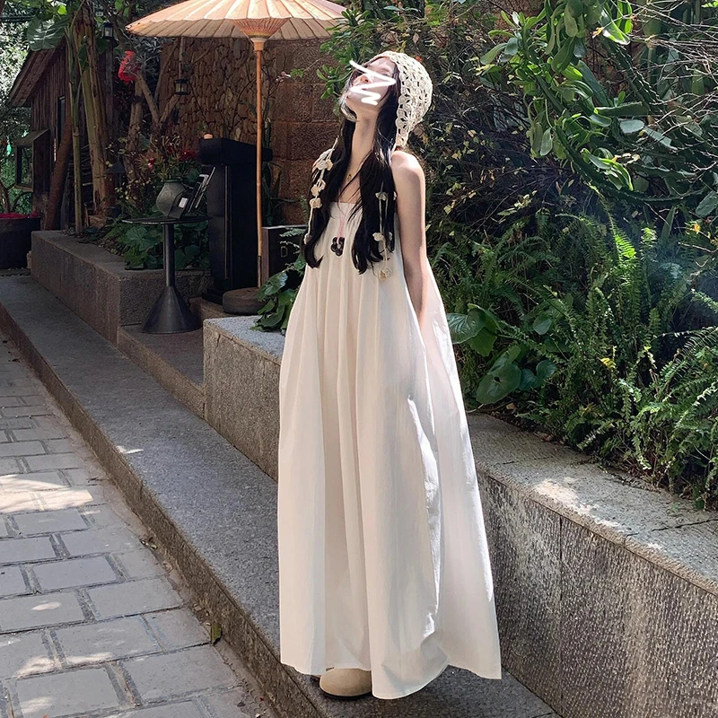 0699白色吊带连衣裙子女夏季2025新款小个子海边度假宽松气质长裙