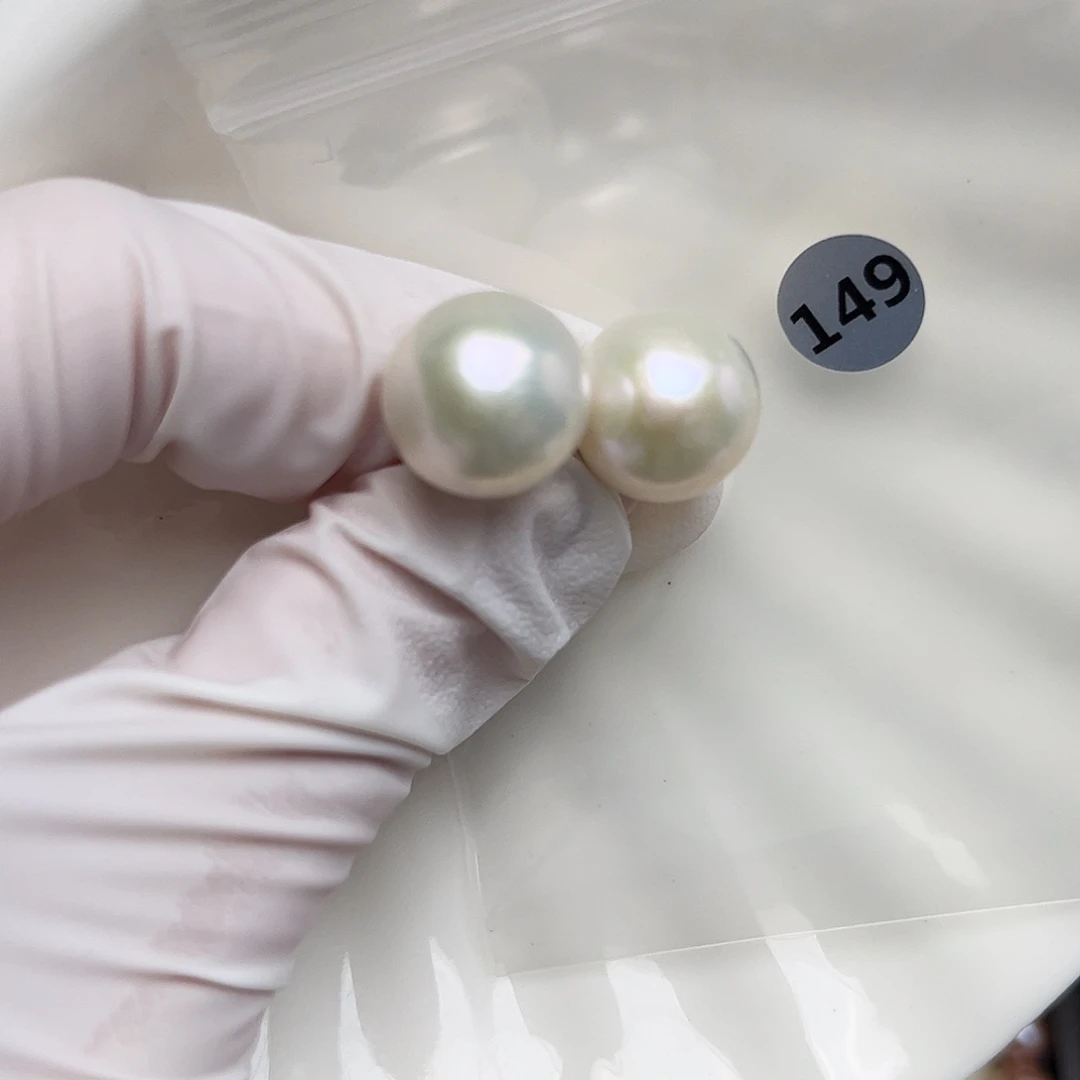 娜***g淡水珍珠银S925镶嵌耳饰