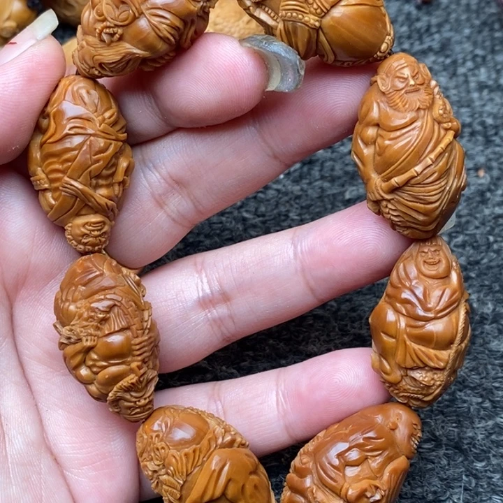 橄榄核吊坠符合你换个环境哈哈哥哥