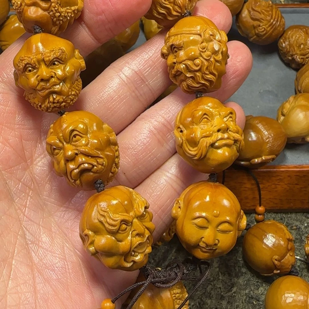 橄榄核吊坠风**里……………………