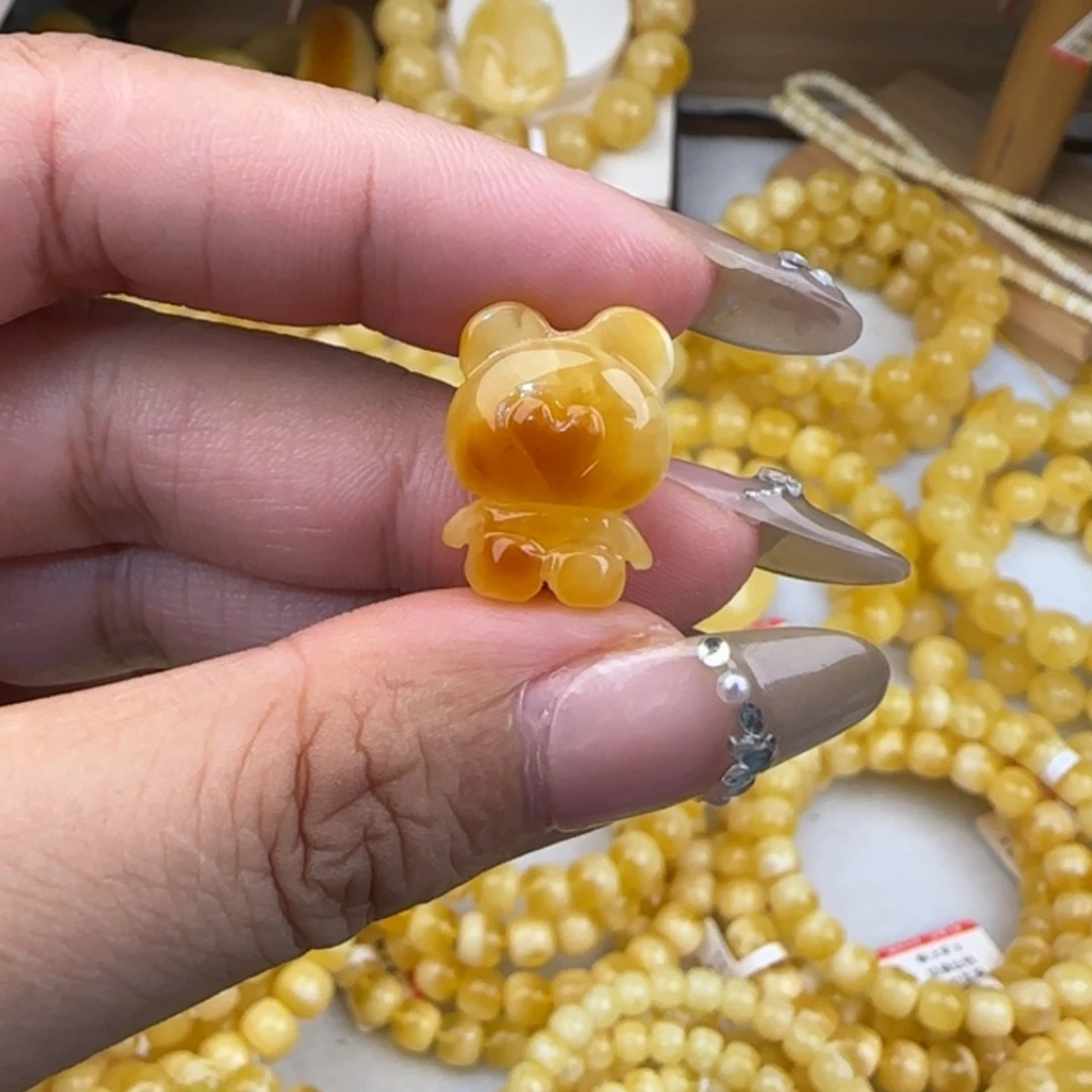 *****蜜蜡未镶嵌裸石蜜蜡白花小熊