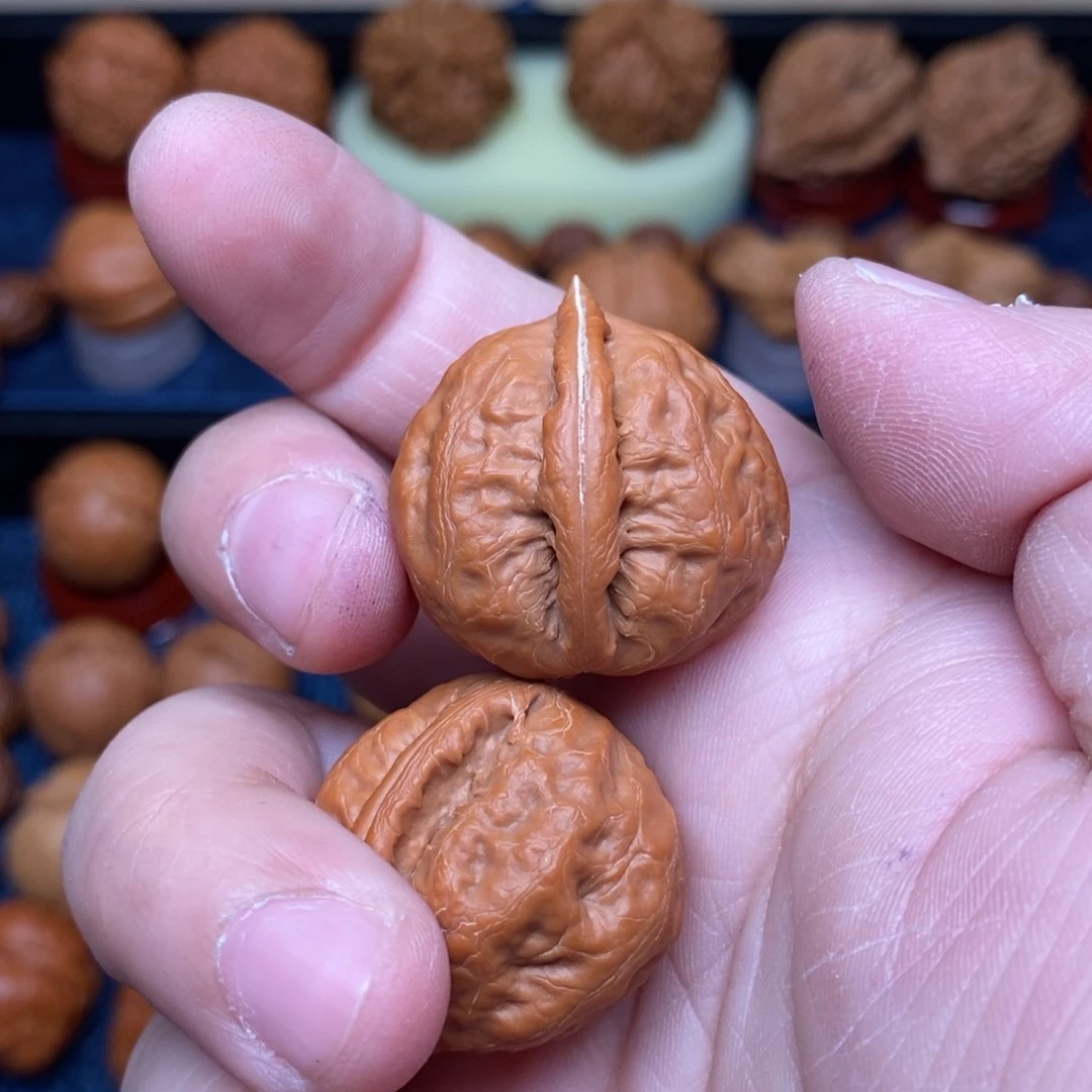 文玩核桃把件奔*爸手捻佛肚元宝