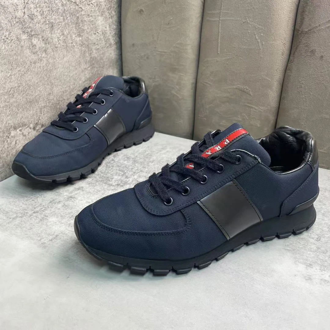 95新 Prada/普拉达 藏蓝色帆布皮革舒适百搭透气运动鞋/41码