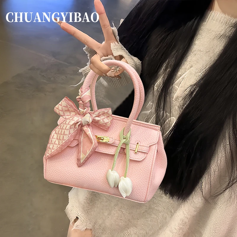 秋冬超火通勤手提粉色凯莉包女2025设计师款同款高级感轻奢斜挎包