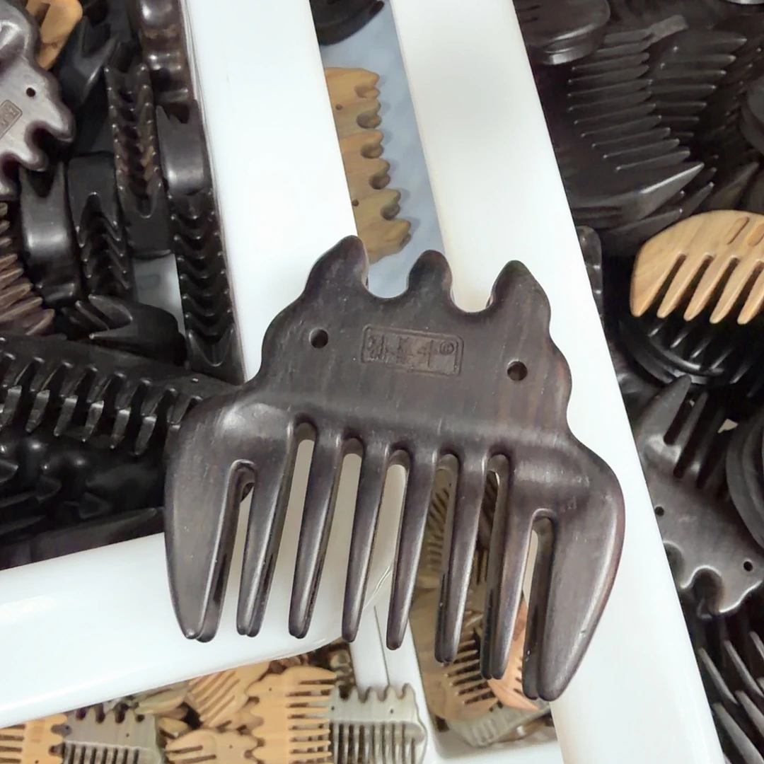 紫光檀三潭印月梳子瑕疵