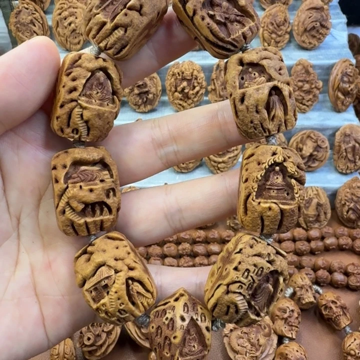 桃核吊坠桃核雕刻材质无相佛手持